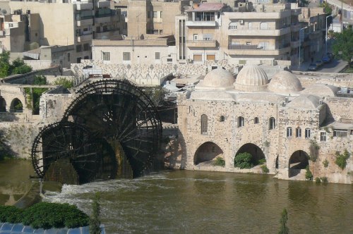 The water wheels at Hama. Around the corner the buildings have bullet marks from an earlier uprising. Ham