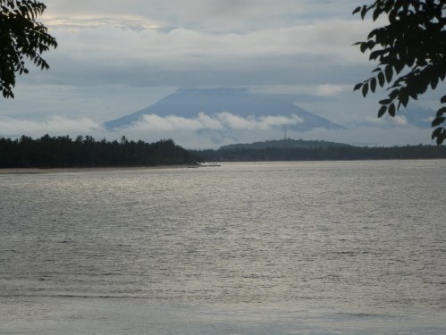 Bali's volcano, Gung Agung, can be seen from this coastline.