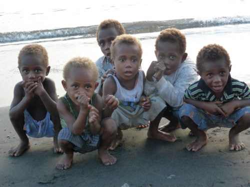 Children watch the awn ceremony