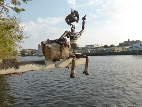 This little vela swings out over the river in front of a the reggae  Yaam bar with sandy floor in Friedrichhhshain