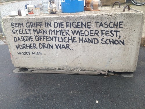 Concrete blocks hold the blue drainage pipes and on many a block is an exhortation from a famous person Goethe, Dante, Voltaire, Gandhi, U.Ecco. This one was from Woody Allen and roughly translates as: 